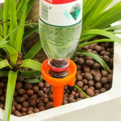 BENOBBY KIDS Unité De Pic D'arrosage Automatique, 1 Pièce Système D'arrosage Automatique Goutte à Goutte Avec Interrupteur De Valve De Contrôle à Libération Lente Pour L'arrosage Des Plantes à La Maison Et En Vacances, Orange